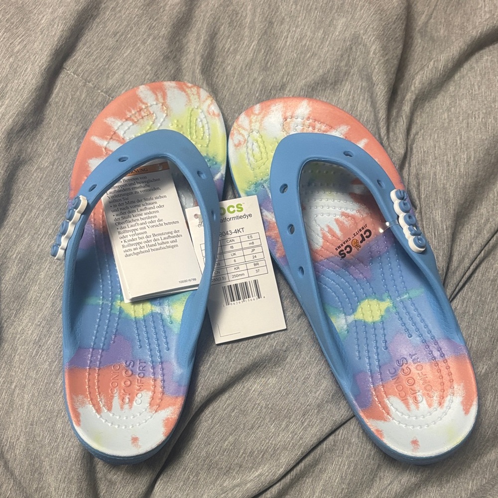 CROCS Women’s Blue and Orange Tie-Dye Flip Flops